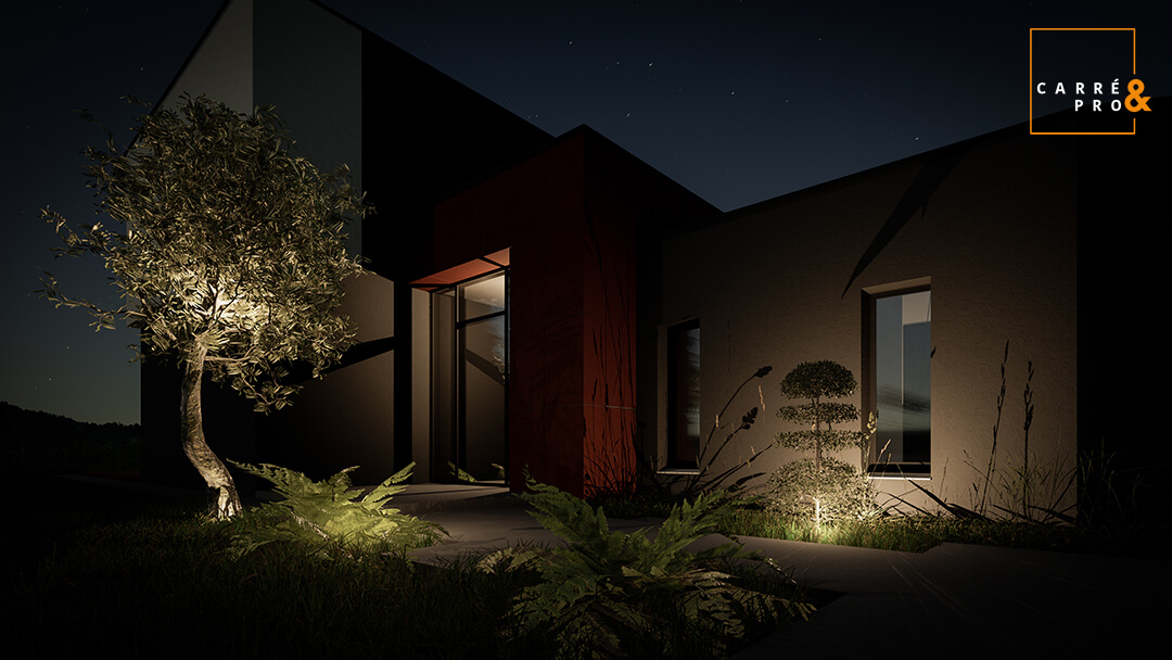 Maison moderne éclairée la nuit avec un olivier.